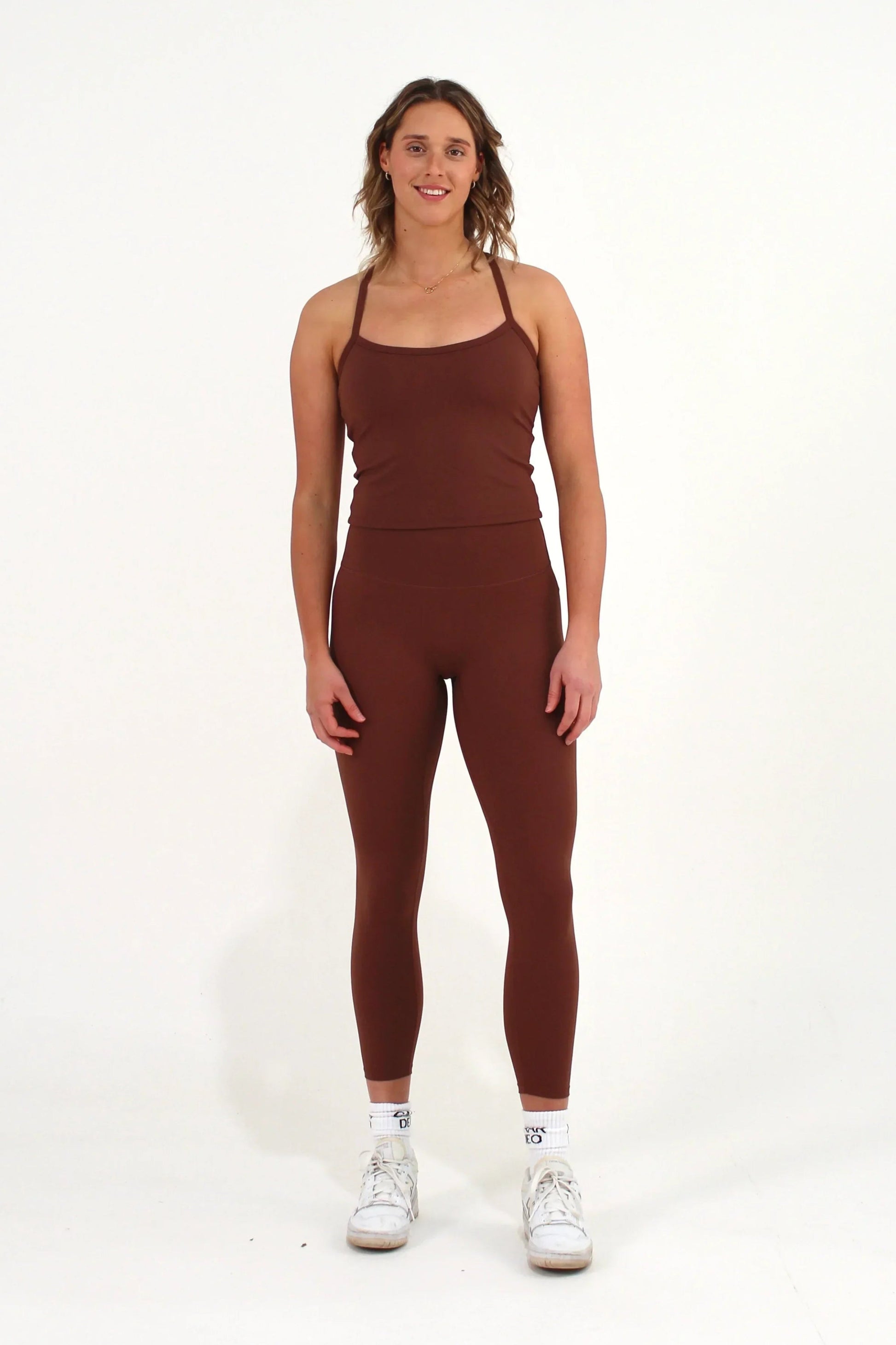 Women wearing brown Caardeo Form Leggings