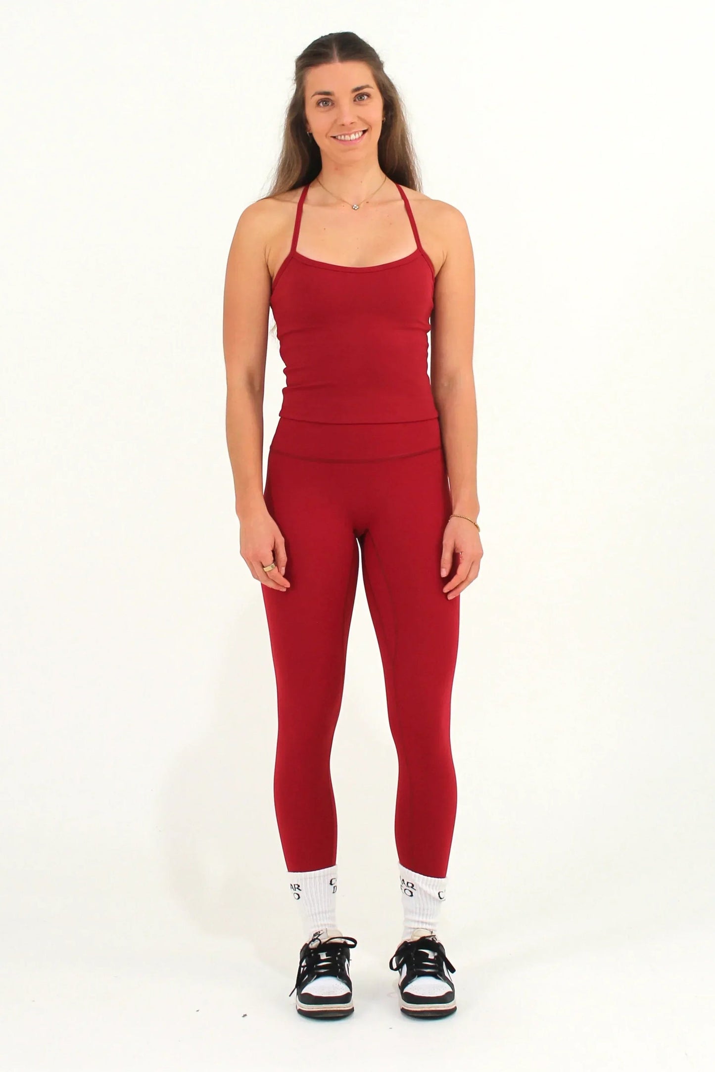 Women wearing red Caardeo Form Leggings