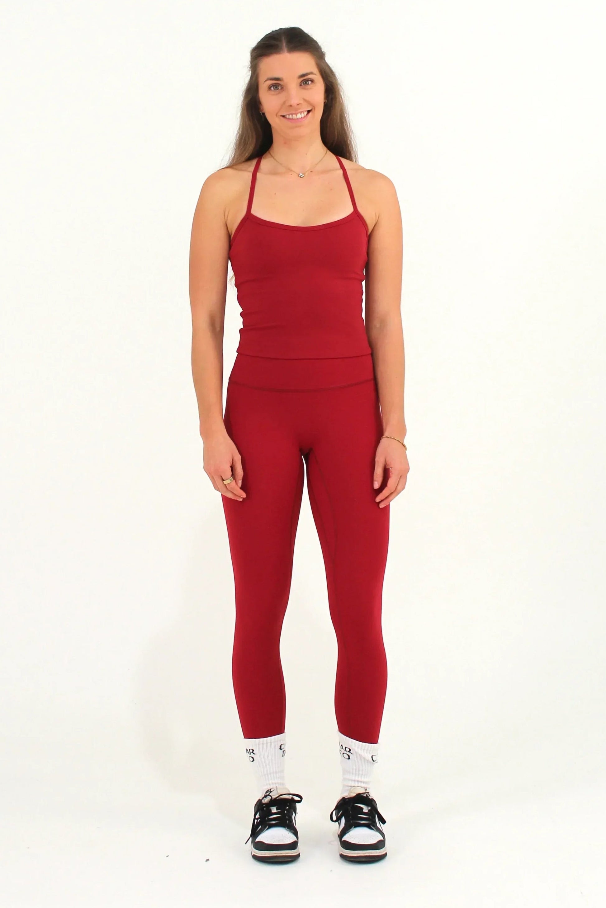 Women wearing red Caardeo Form Leggings